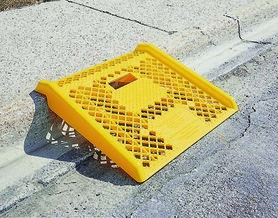 YELLOW PLASTIC CURB RAMP